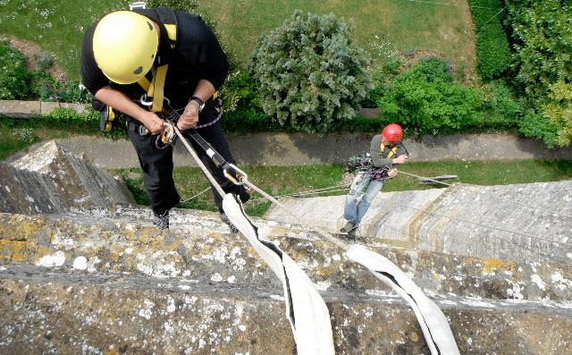 abseiling down building