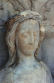 Medieval Statuary, nose fixed